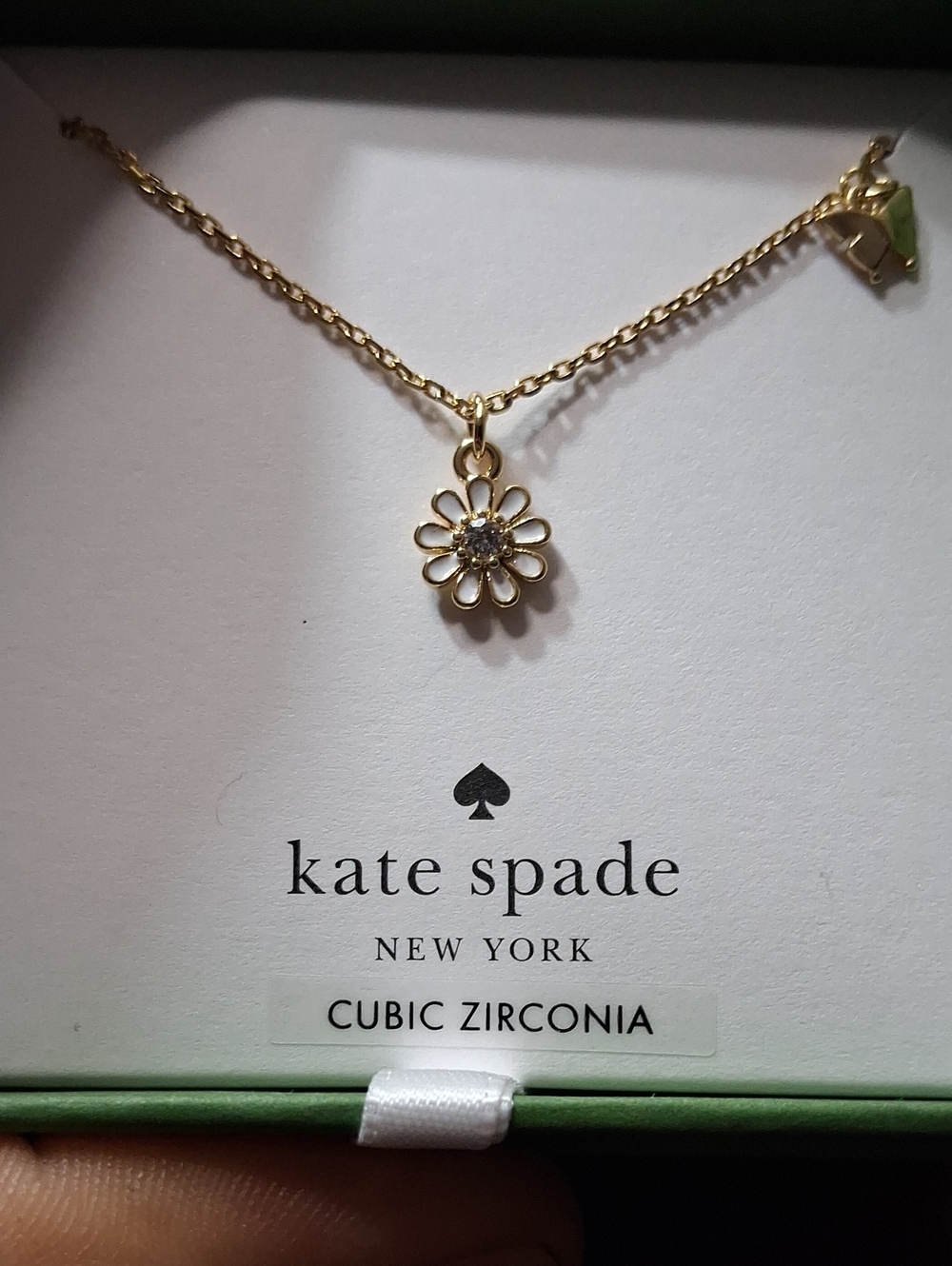 kate spade gold and white daisy pendant necklace with crystal center